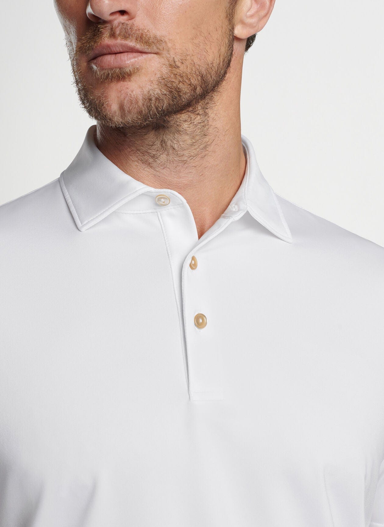 SOLID PERFORMANCE JERSEY POLO